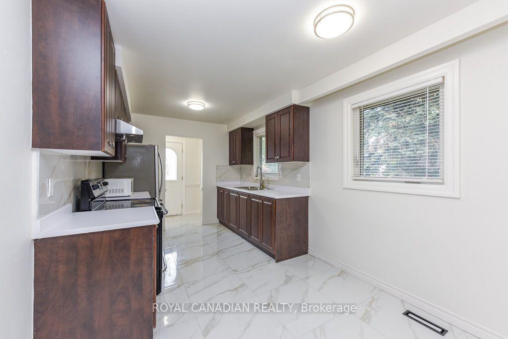 Photo 9 of 7700 Kittridge Drive, Mississauga, Malton — HOMEH