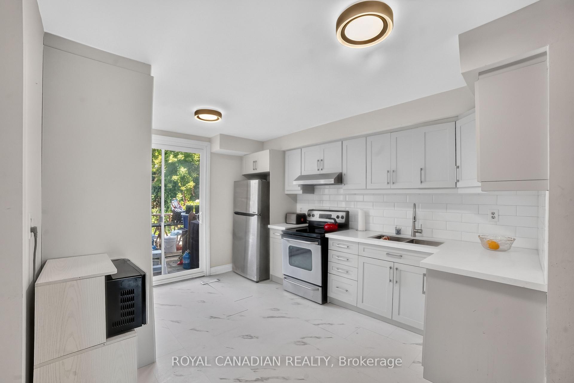 Photo 37 of 2538 St Clair Avenue W, Toronto, Rockcliffe-Smythe — HOMEH