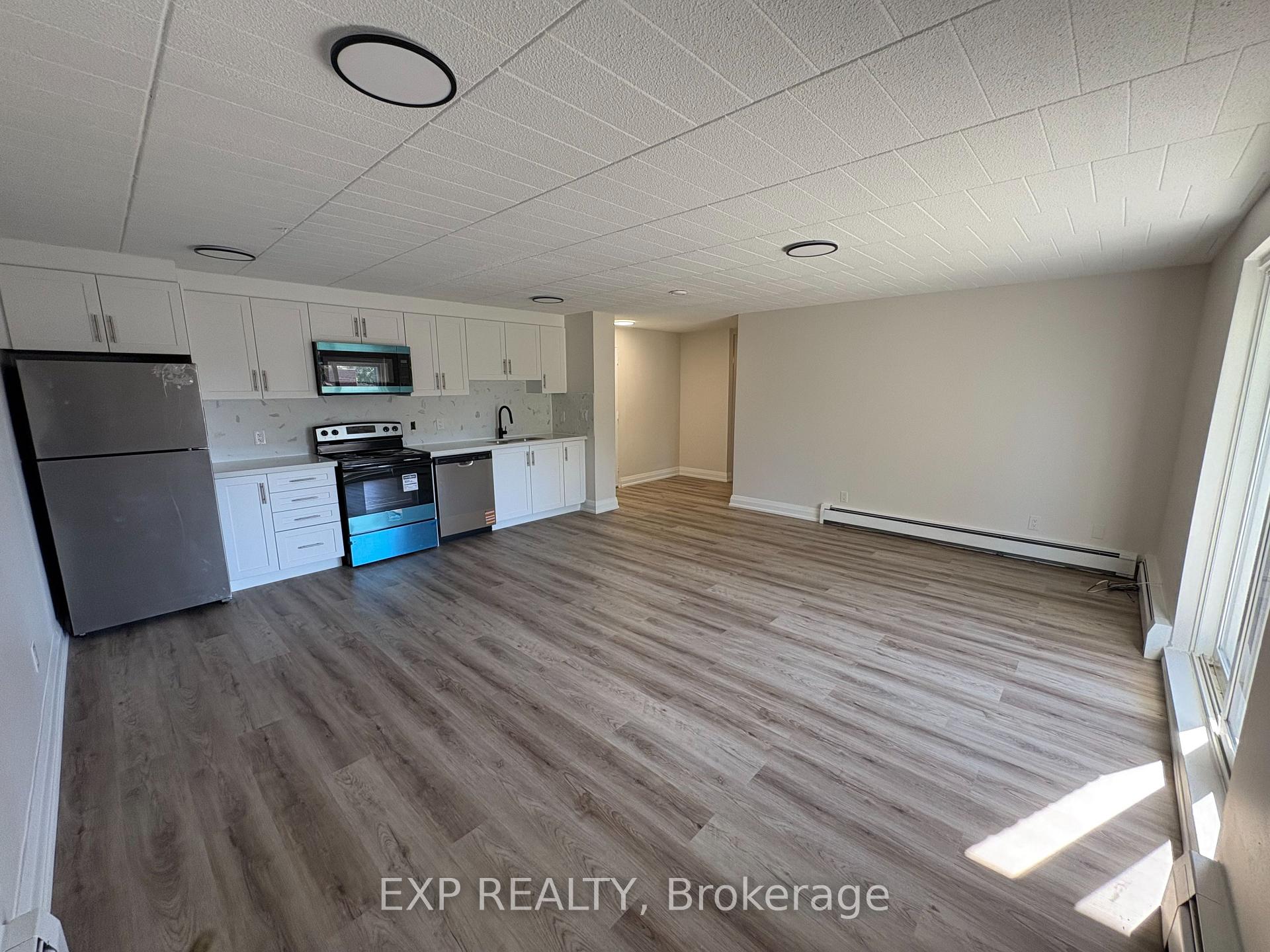 Photo 1 of Unit 406, 4422 Huron Street, Niagara Falls, Downtown — HOMEH