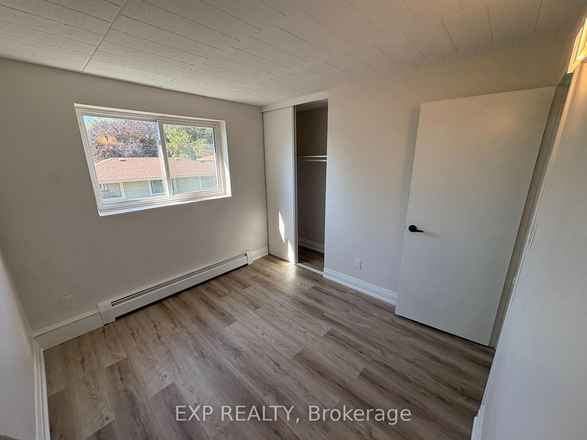 Photo 2 of Unit 406, 4422 Huron Street, Niagara Falls, Downtown — HOMEH