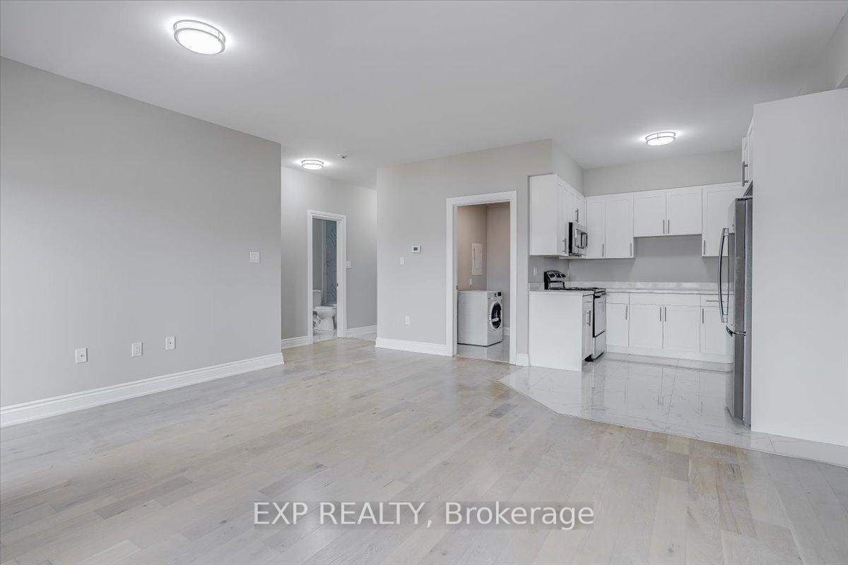 Photo 3 of Unit 201, 163 Port Robinson Road, Pelham, Fonthill — HOMEH
