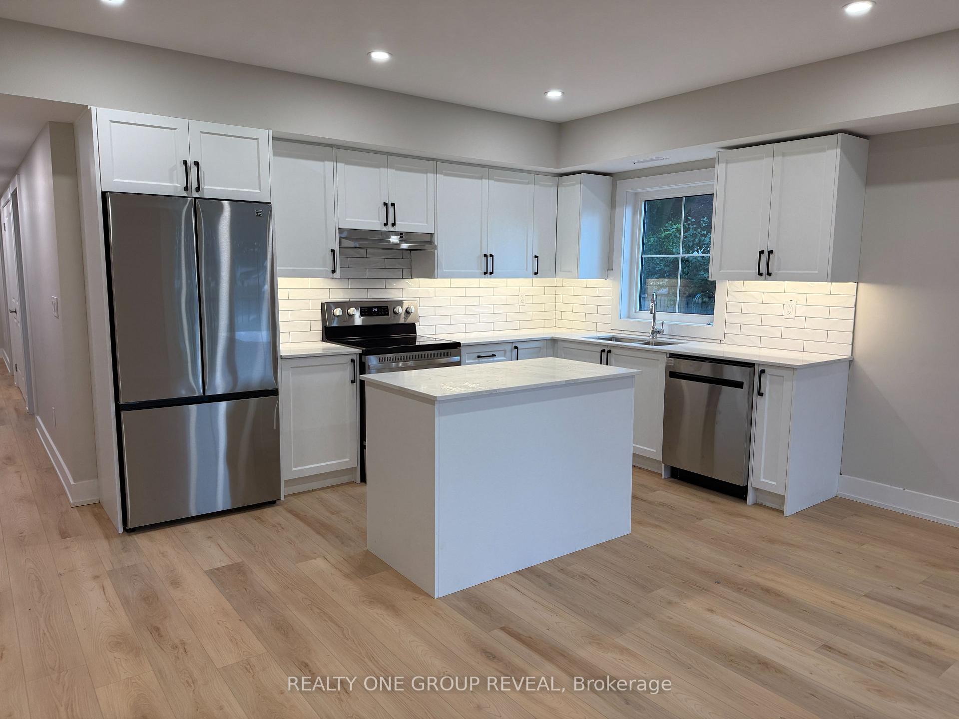 Photo 3 of Unit 1, 24 Queen Street, Clarington, Bowmanville — HOMEH