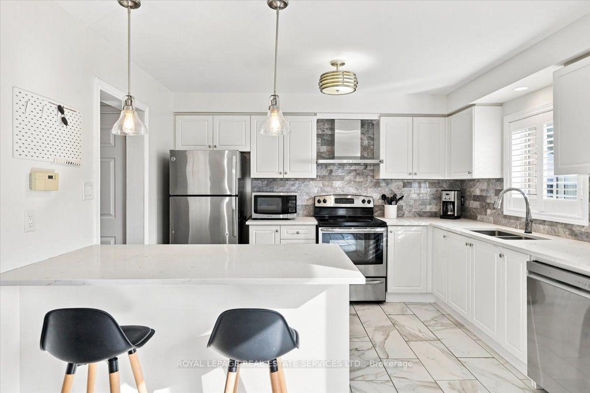 Photo 10 of Unit 3, 2970 Berwick Drive, Burlington, Rose — HOMEH