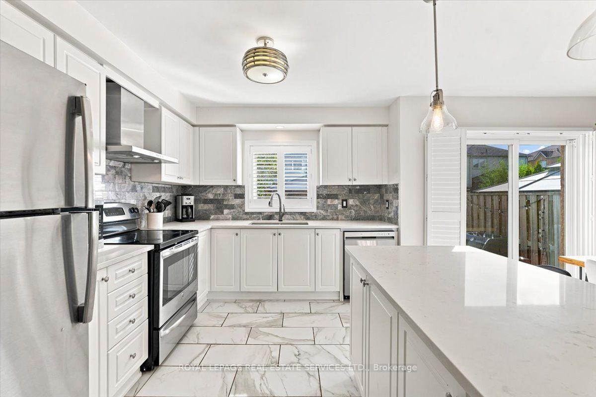 Photo 11 of Unit 3, 2970 Berwick Drive, Burlington, Rose — HOMEH