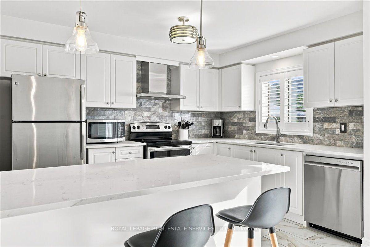 Photo 13 of Unit 3, 2970 Berwick Drive, Burlington, Rose — HOMEH