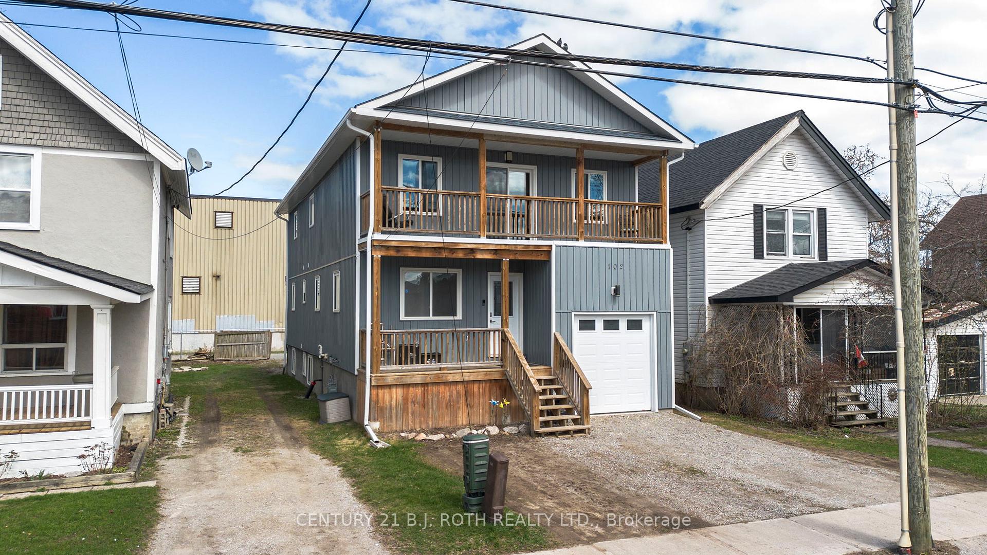 Photo 2 of 102 Dunlop Street, Orillia — HOMEH