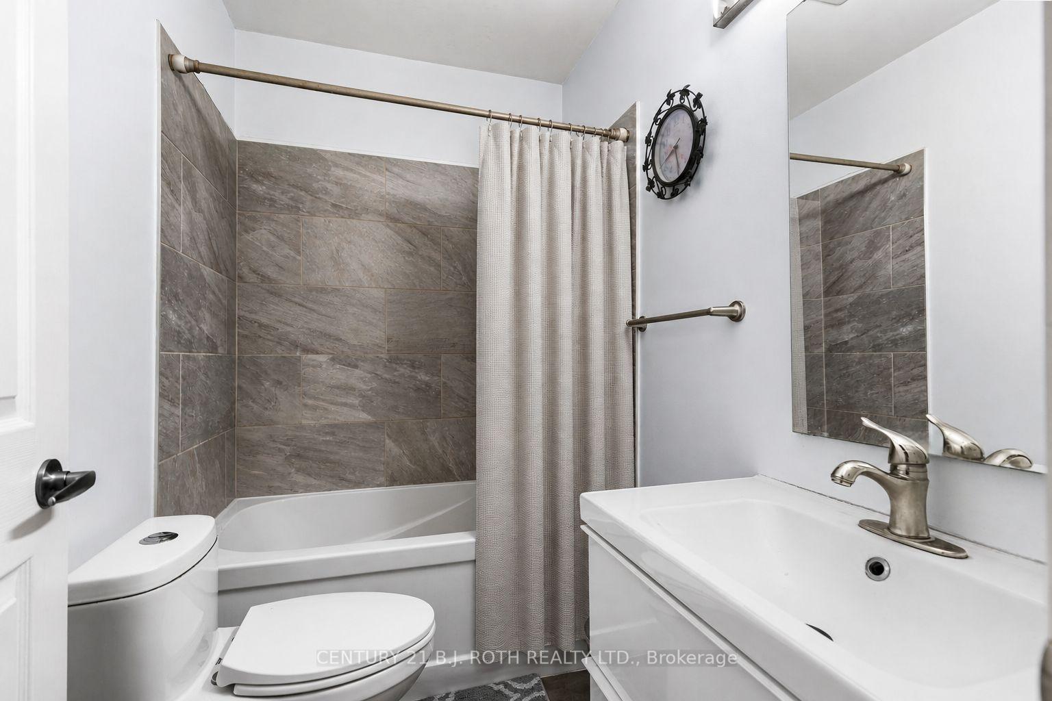 Photo 10 of 102 Dunlop Street, Orillia — HOMEH