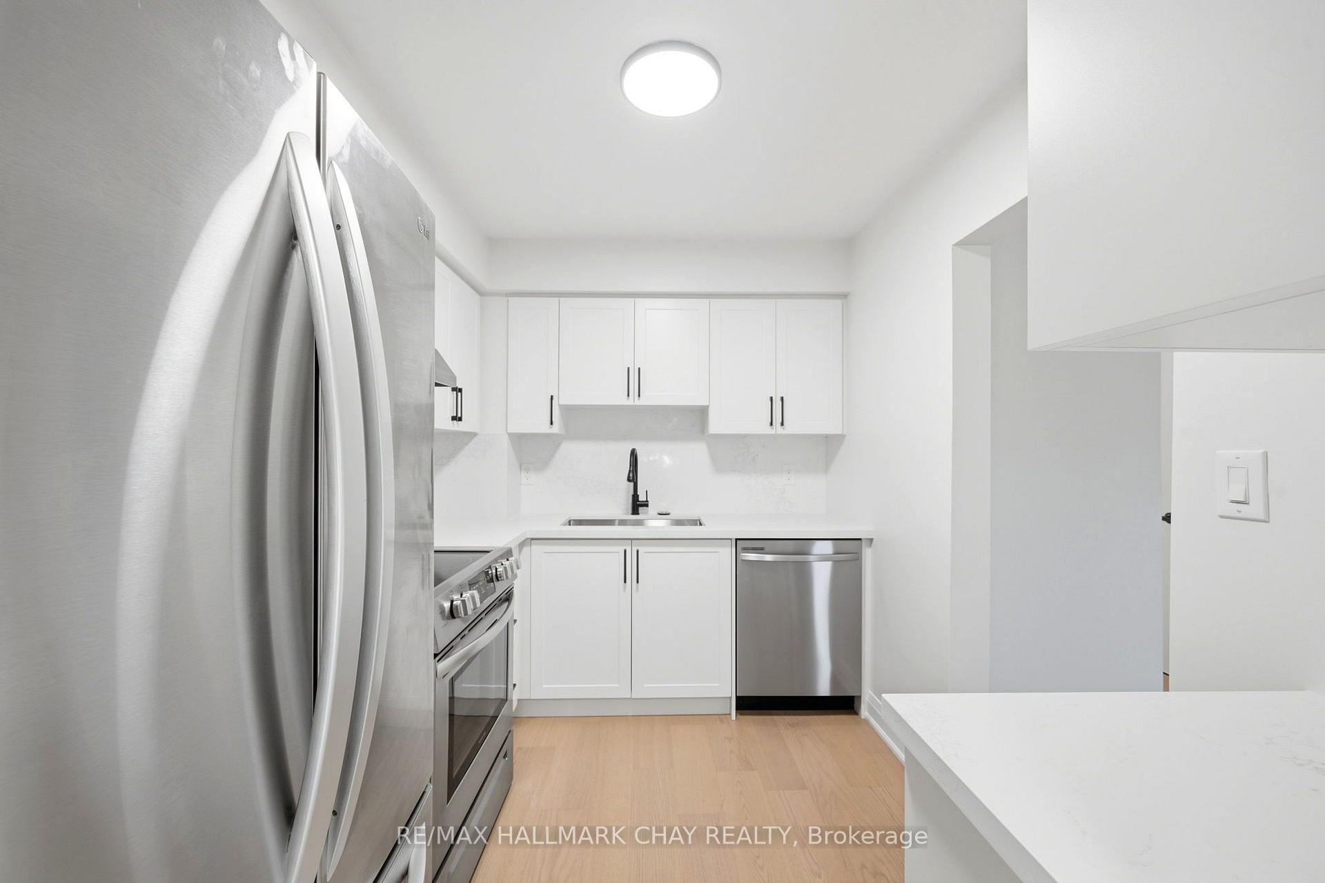 Photo 7 of Unit 6, 52 Adelaide Street, Barrie, Allandale — HOMEH