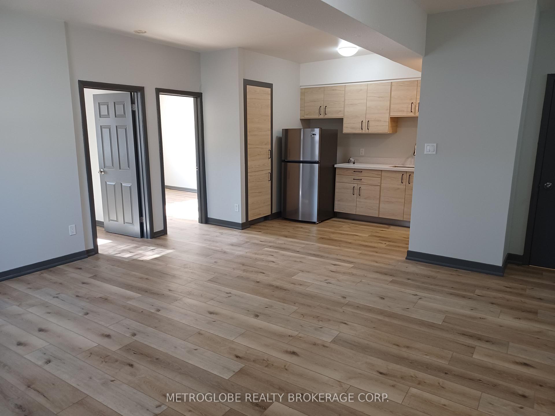 Photo 4 of Unit 11, 191 Lakeshore Road E, Mississauga, Port Credit — HOMEH