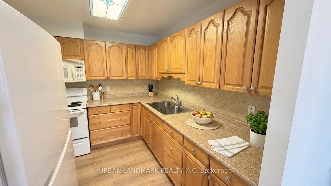 Photo 4 of Unit 201, 131 Taunton Road E, Oshawa, Centennial — HOMEH