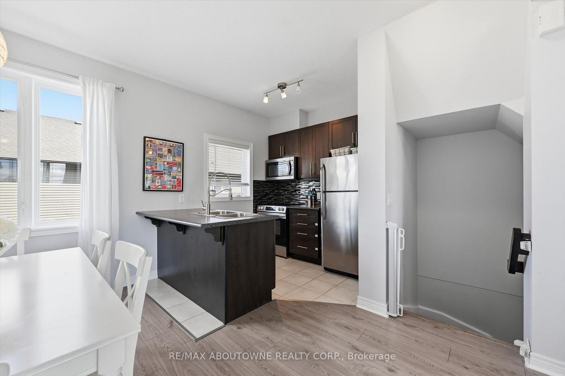 Photo 10 of Unit 10, 2985 Jackson Drive, Burlington, Rose — HOMEH