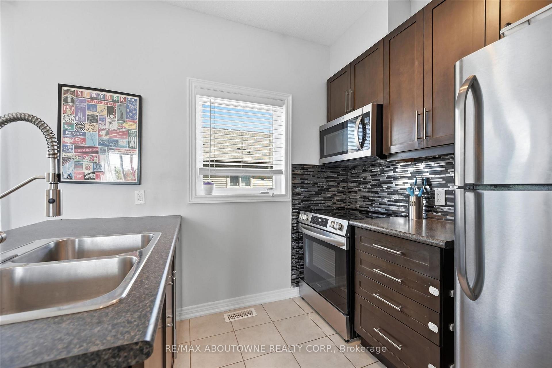 Photo 11 of Unit 10, 2985 Jackson Drive, Burlington, Rose — HOMEH