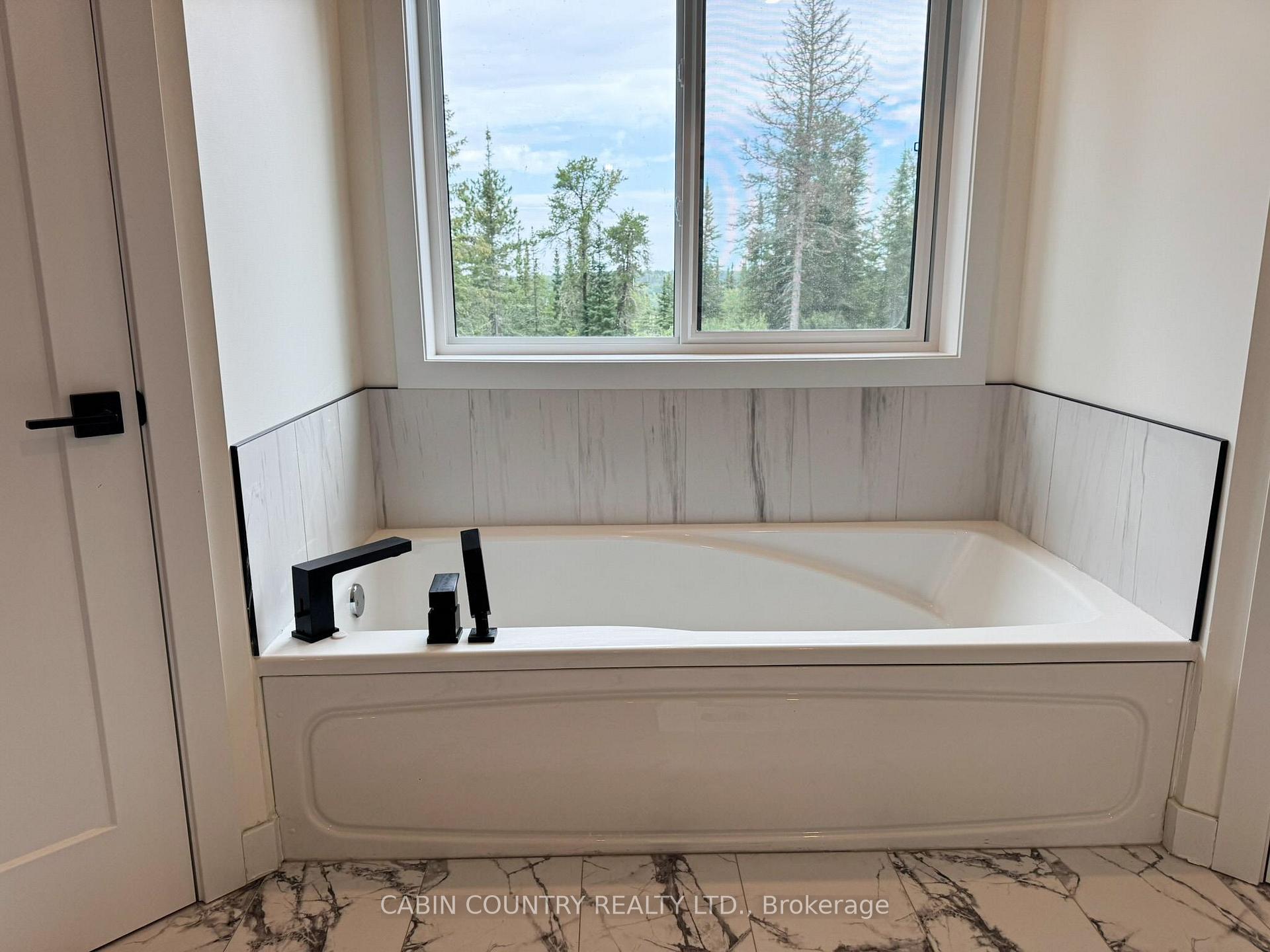 Photo 31 of 812A East Melick Road, Kenora, Kenora Northeast — HOMEH