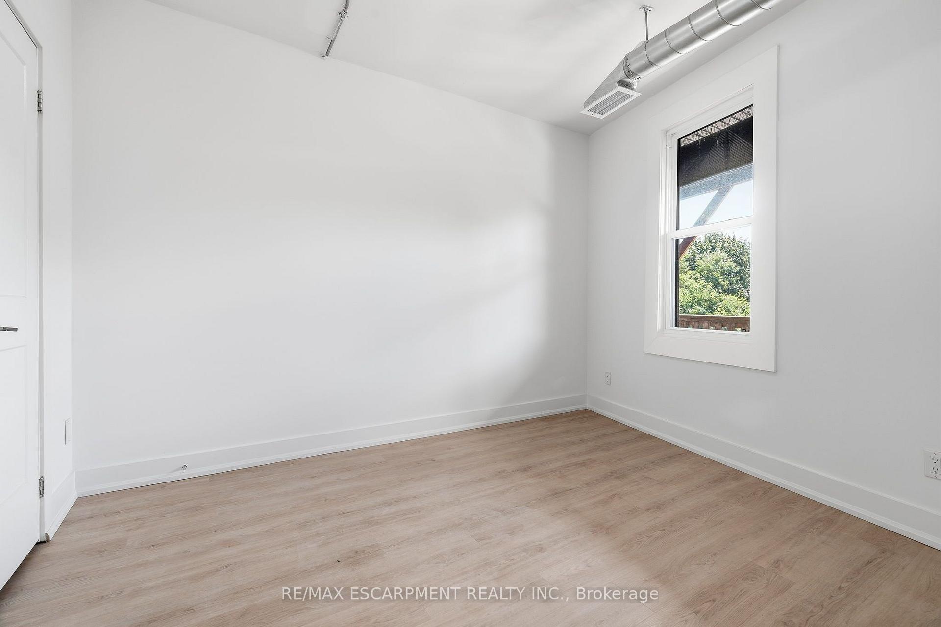 Photo 4 of Unit 02, 1006 King Street E, Hamilton, Stipley — HOMEH