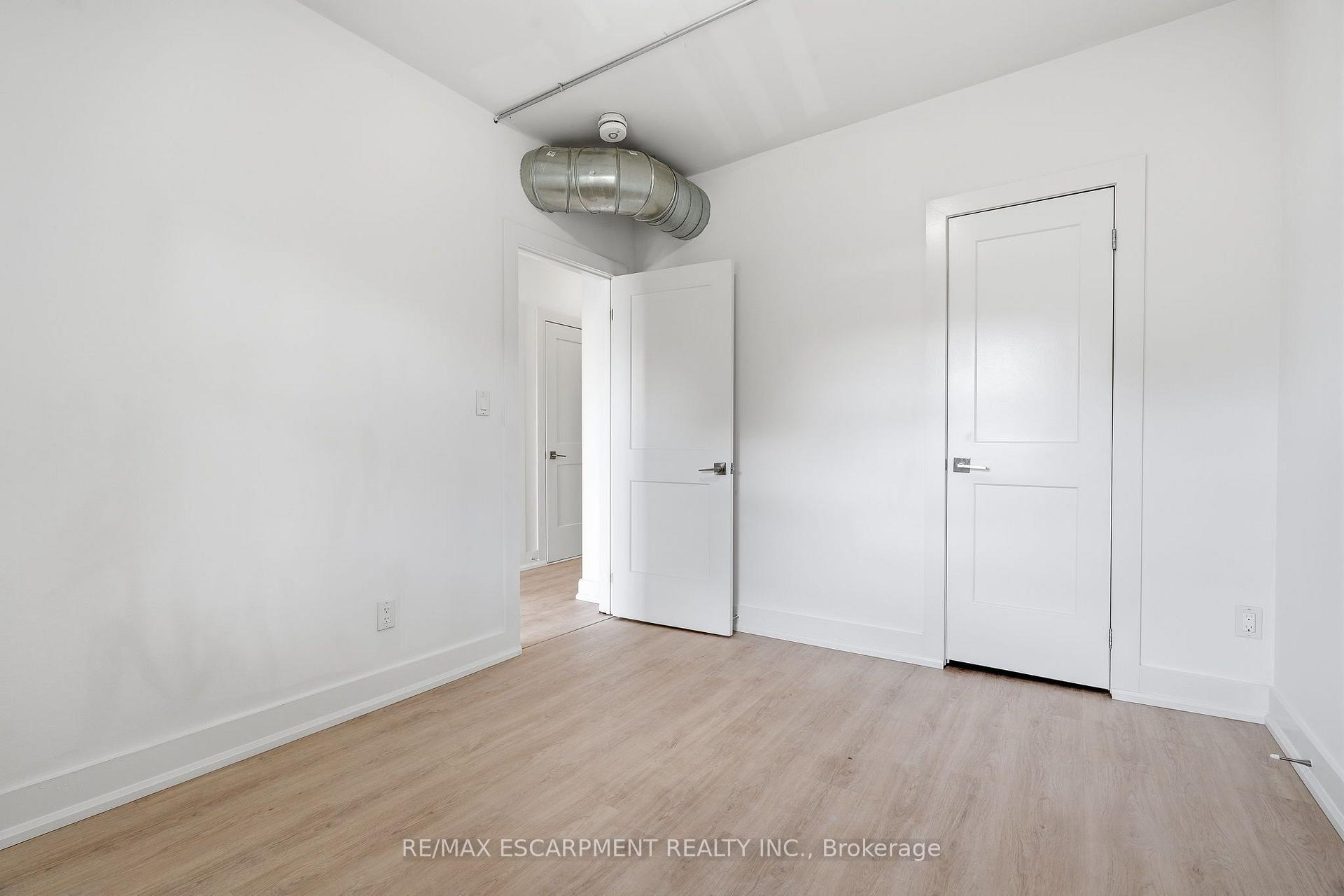 Photo 5 of Unit 02, 1006 King Street E, Hamilton, Stipley — HOMEH