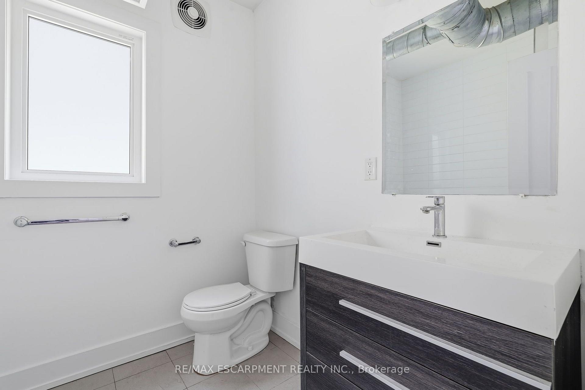 Photo 9 of Unit 02, 1006 King Street E, Hamilton, Stipley — HOMEH