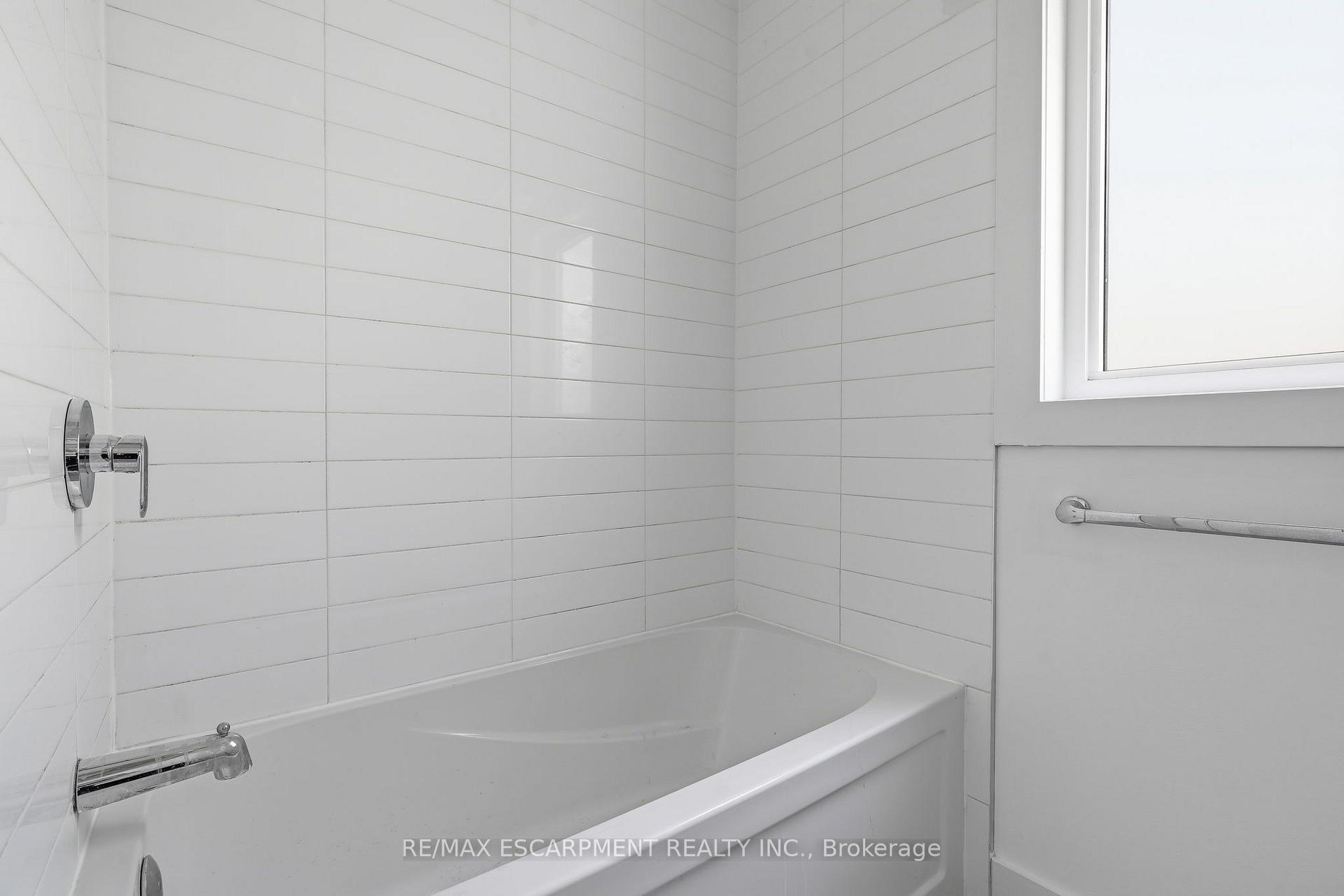 Photo 10 of Unit 02, 1006 King Street E, Hamilton, Stipley — HOMEH