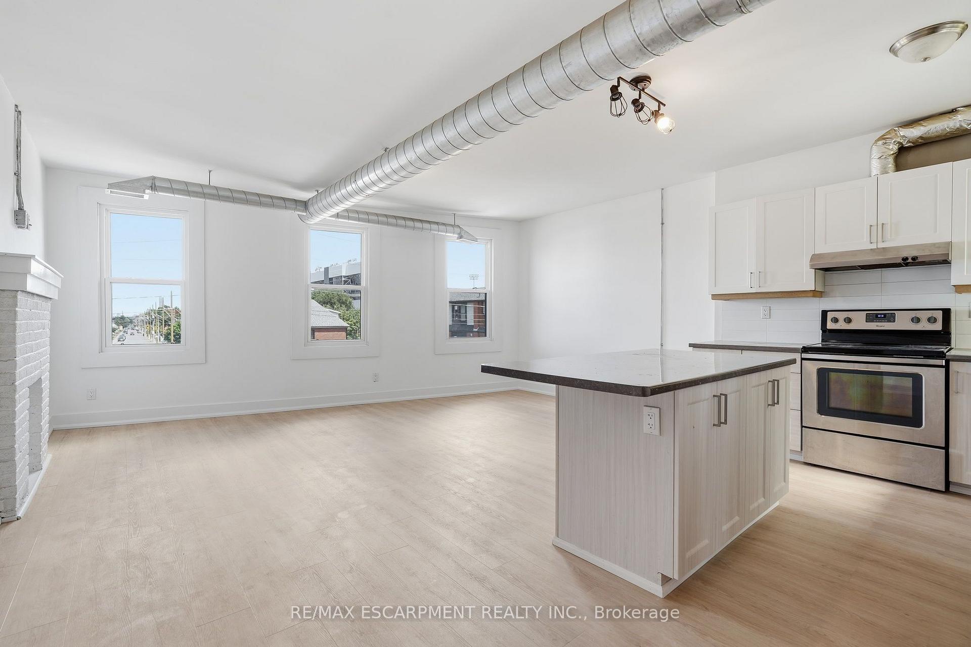 Photo 11 of Unit 02, 1006 King Street E, Hamilton, Stipley — HOMEH