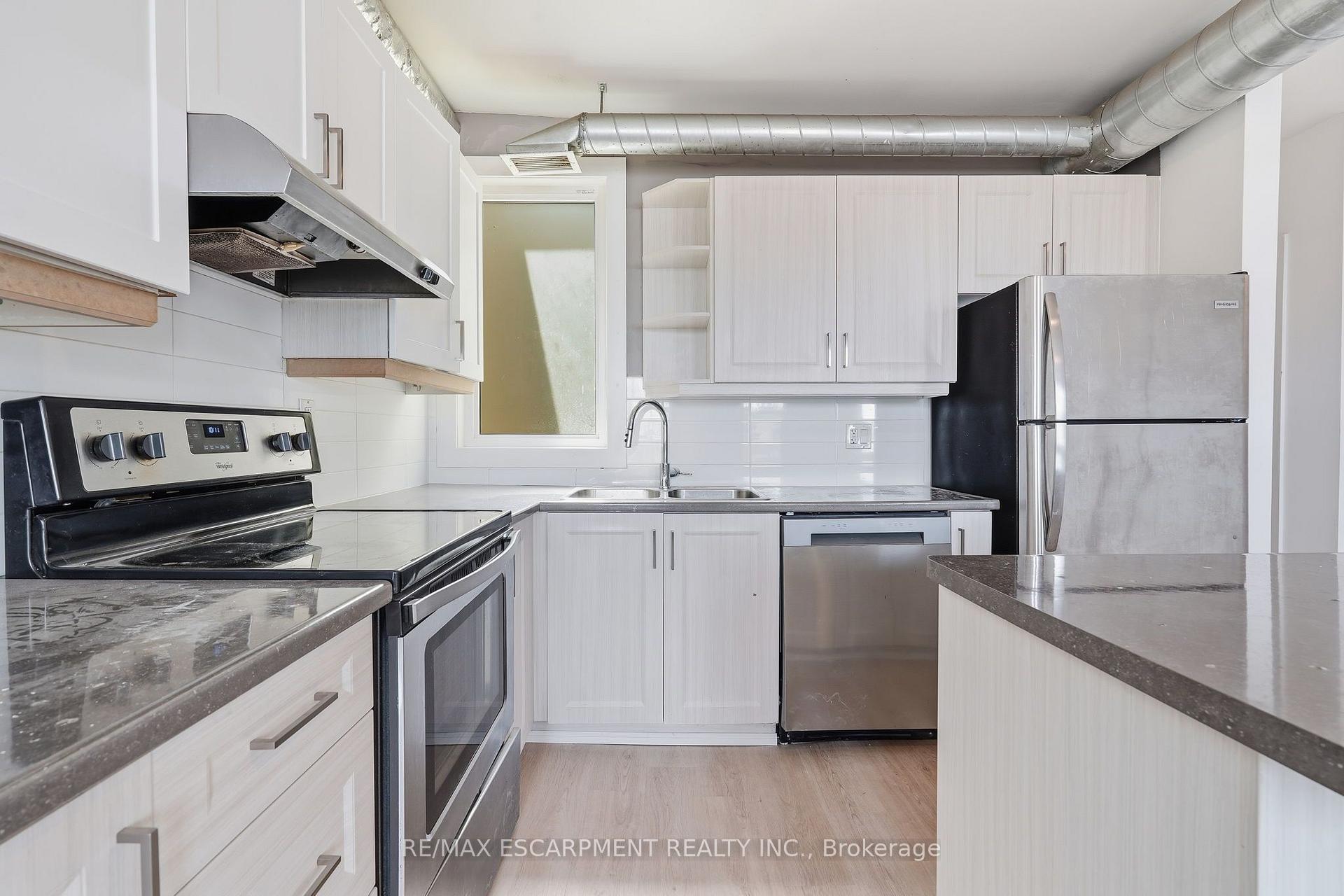 Photo 14 of Unit 02, 1006 King Street E, Hamilton, Stipley — HOMEH