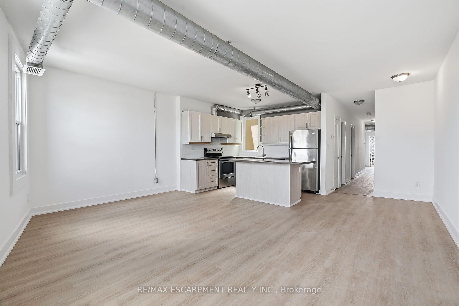 Photo 15 of Unit 02, 1006 King Street E, Hamilton, Stipley — HOMEH