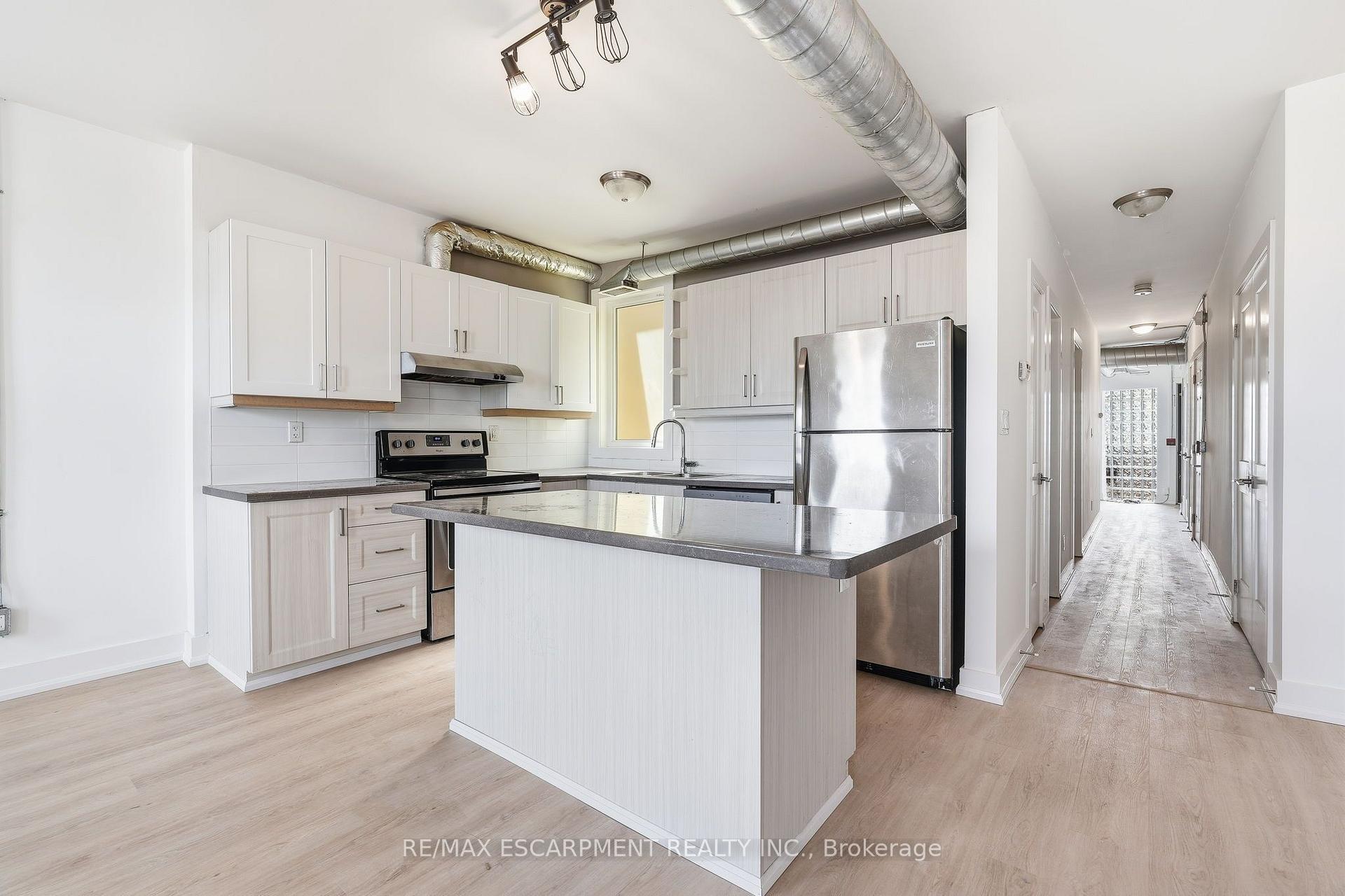 Photo 17 of Unit 02, 1006 King Street E, Hamilton, Stipley — HOMEH