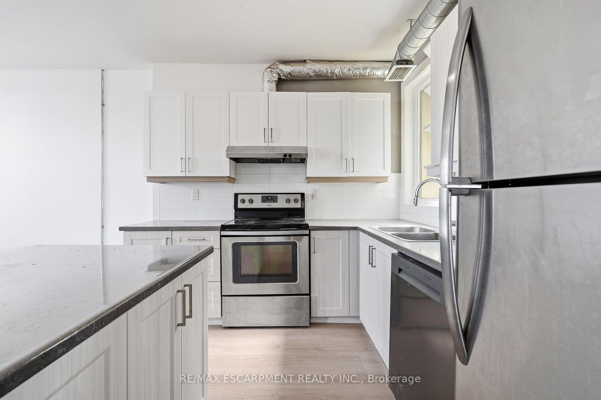 Photo 18 of Unit 02, 1006 King Street E, Hamilton, Stipley — HOMEH