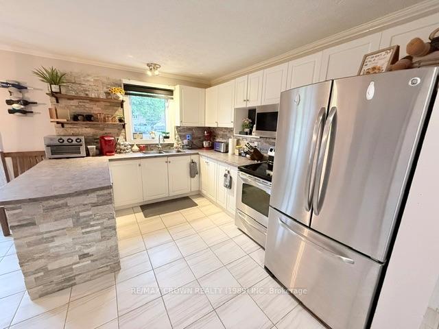 Photo 15 of 16 Mateev Avenue, Kapuskasing — HOMEH
