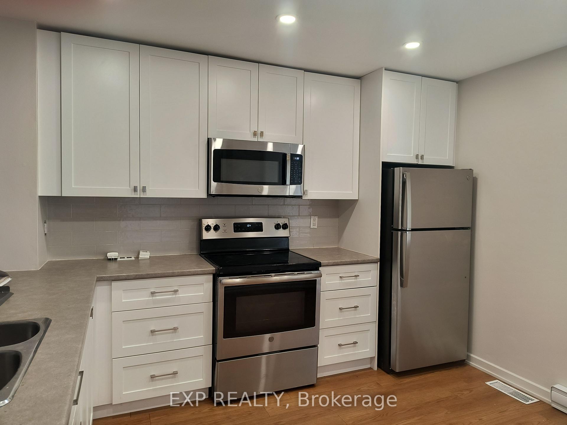 Photo 2 of Unit 002, 1310 Richmond Road, Ottawa, Lincoln Heights — HOMEH
