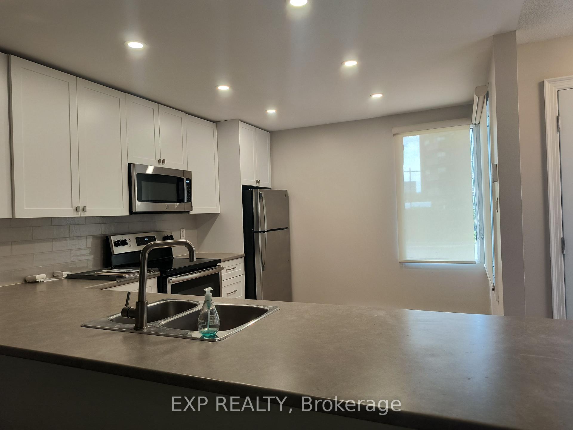 Photo 3 of Unit 002, 1310 Richmond Road, Ottawa, Lincoln Heights — HOMEH