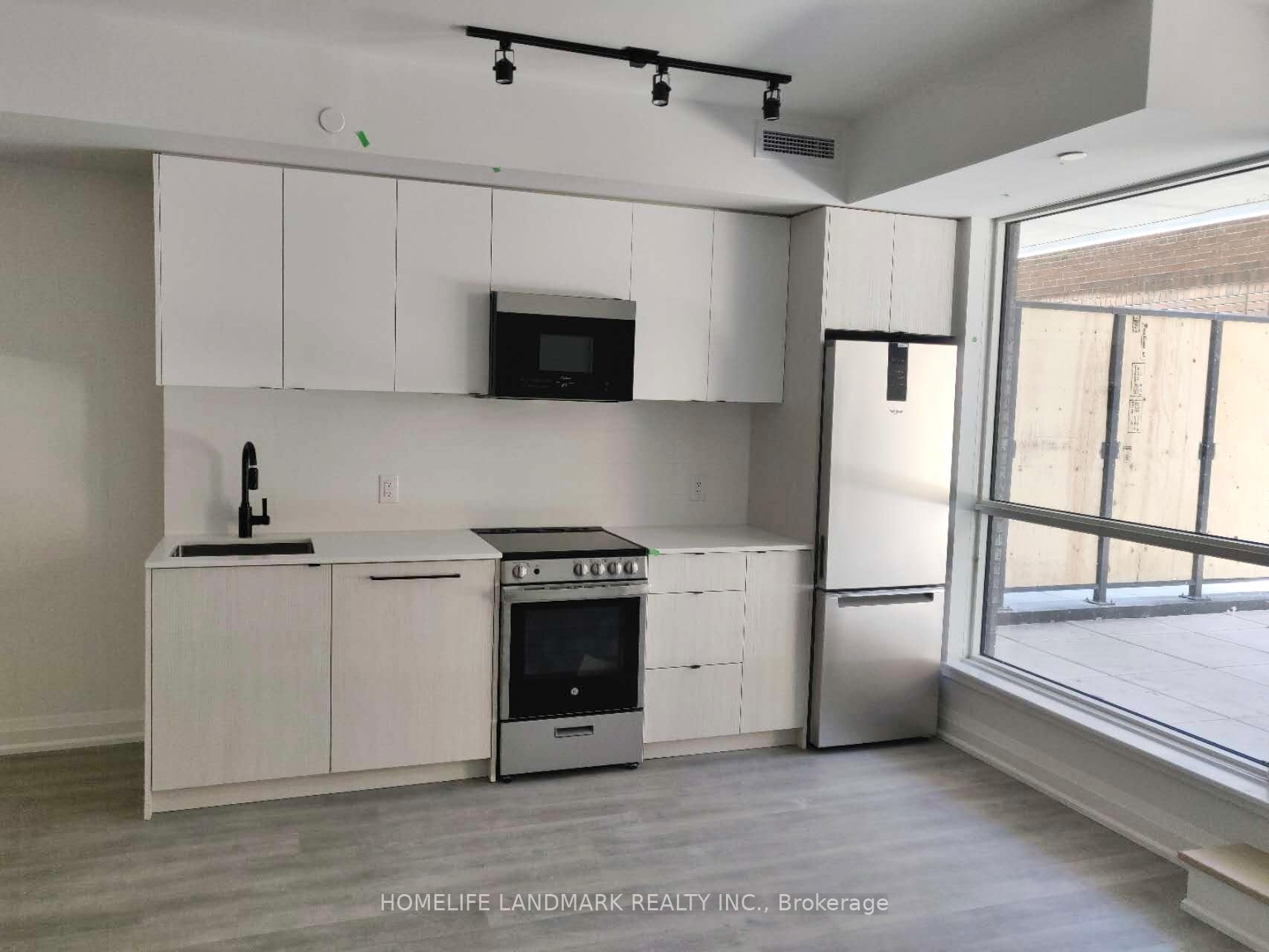 Photo 3 of Unit 202, 2369 Danforth Avenue, Toronto, East End-Danforth — HOMEH