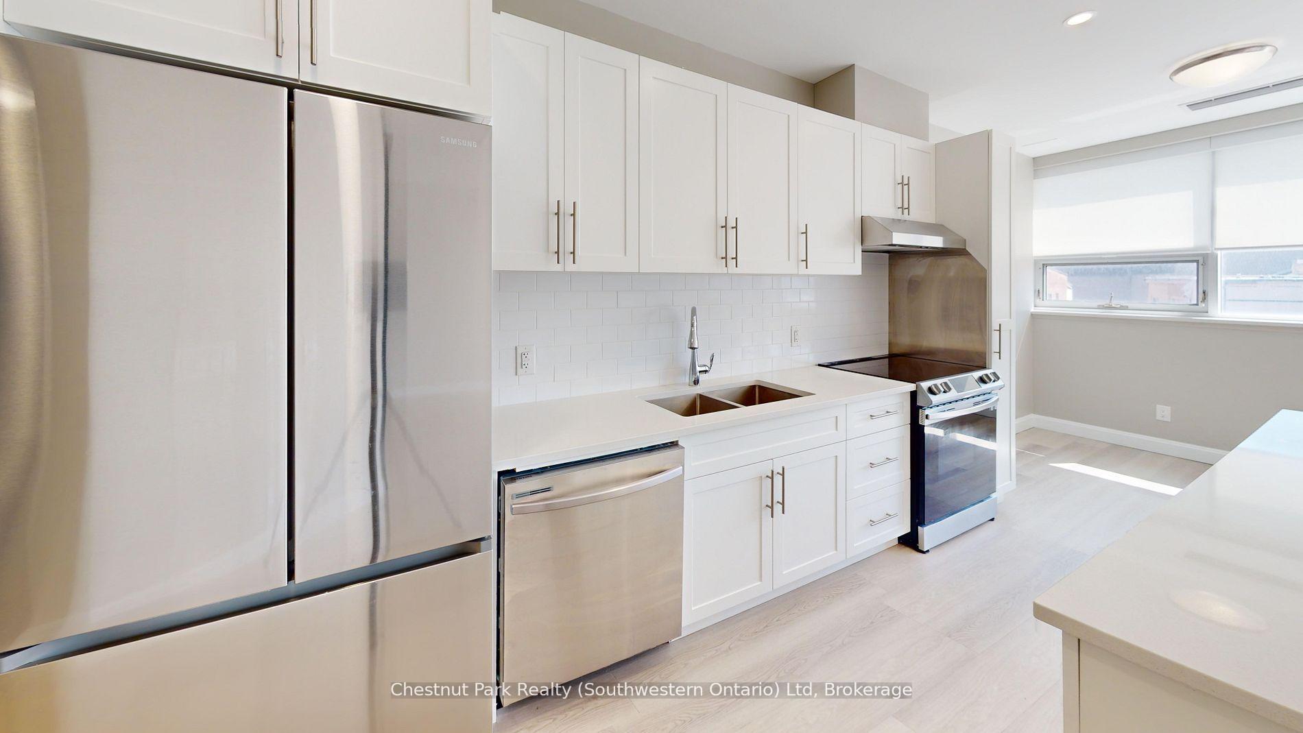 Photo 2 of Unit 206, 2 Quebec Street, Guelph, Downtown — HOMEH