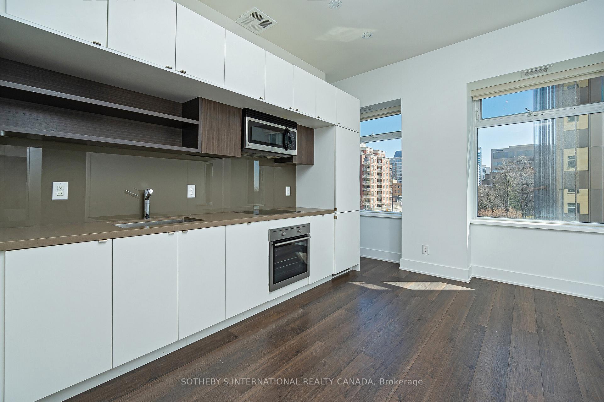 Photo 6 of Unit 406, 111 St Clair Avenue W, Toronto, Yonge-St. Clair — HOMEH