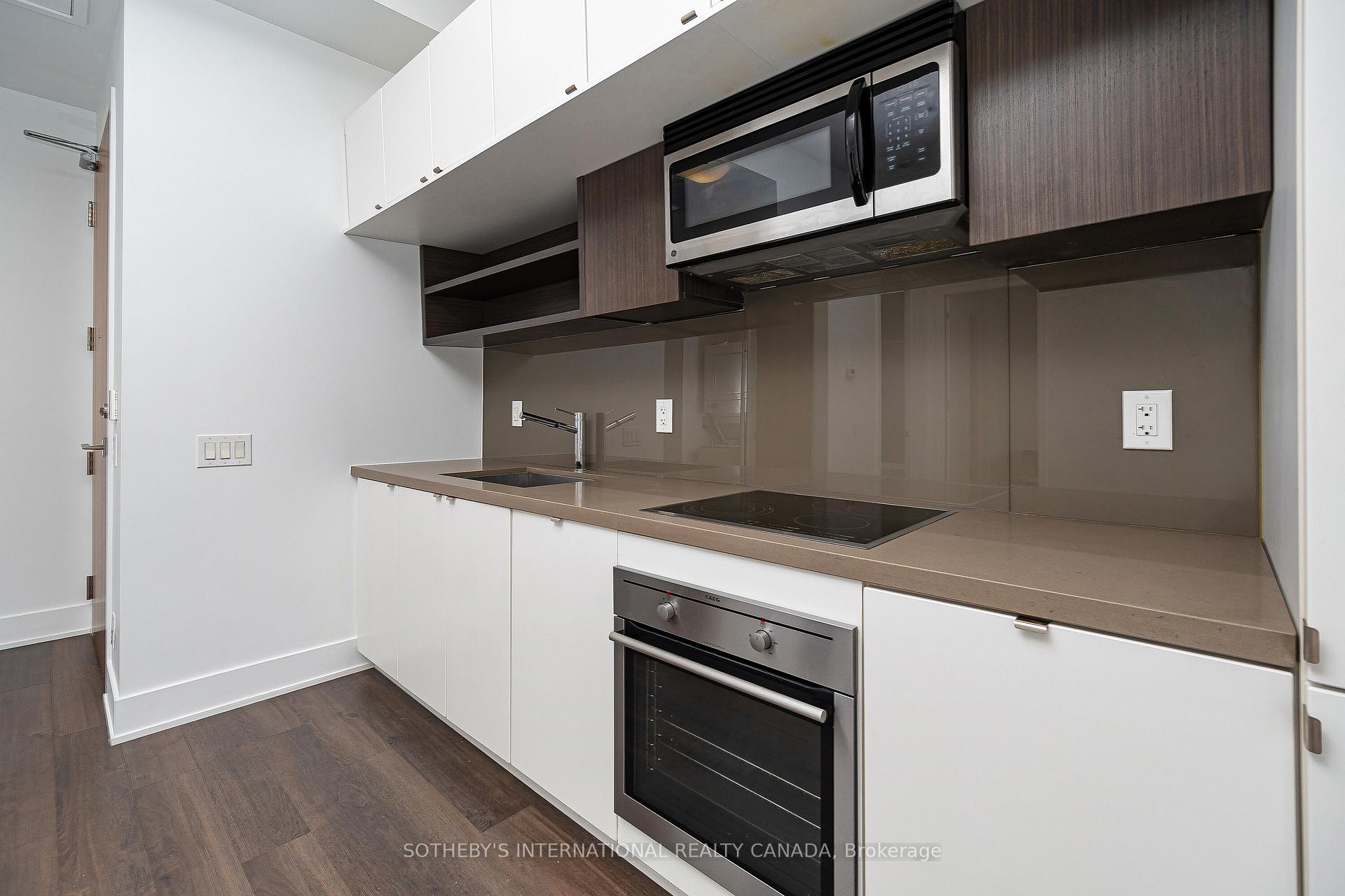 Photo 9 of Unit 406, 111 St Clair Avenue W, Toronto, Yonge-St. Clair — HOMEH