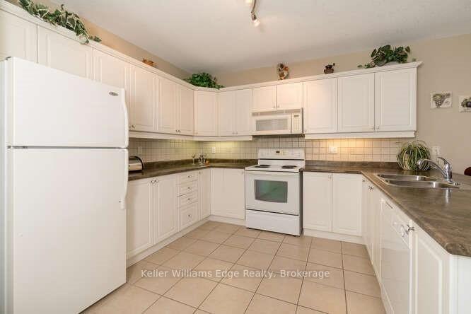 Photo 11 of Unit 309, 1998 Ironstone Drive NE, Burlington, Uptown — HOMEH