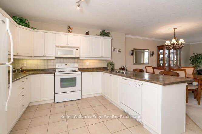 Photo 12 of Unit 309, 1998 Ironstone Drive NE, Burlington, Uptown — HOMEH