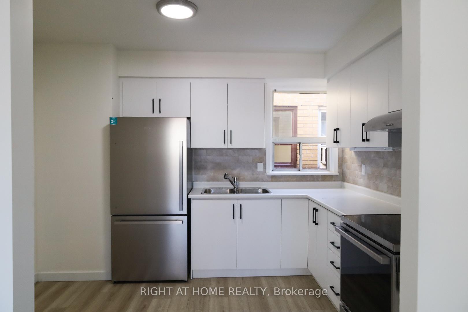 Photo 3 of 553 Rogers Road, Toronto, Keelesdale-Eglinton West — HOMEH
