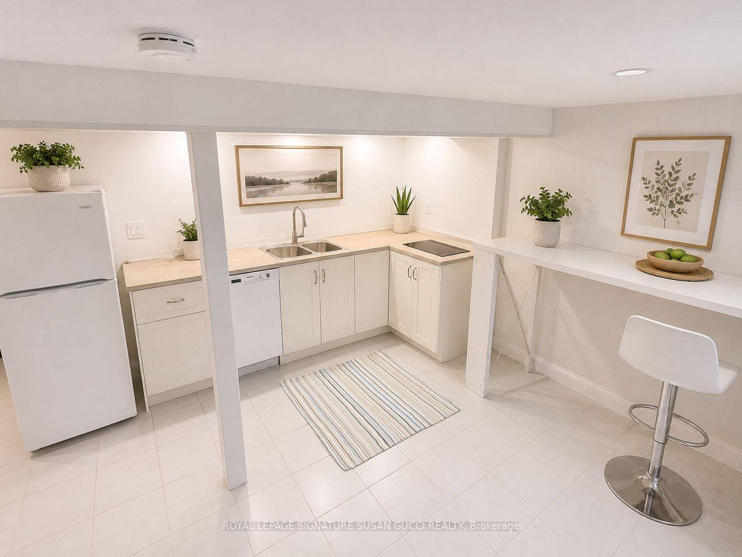 Photo 2 of Unit Lower, 31 Lesmount Avenue, Toronto, Danforth Village-East York — HOMEH