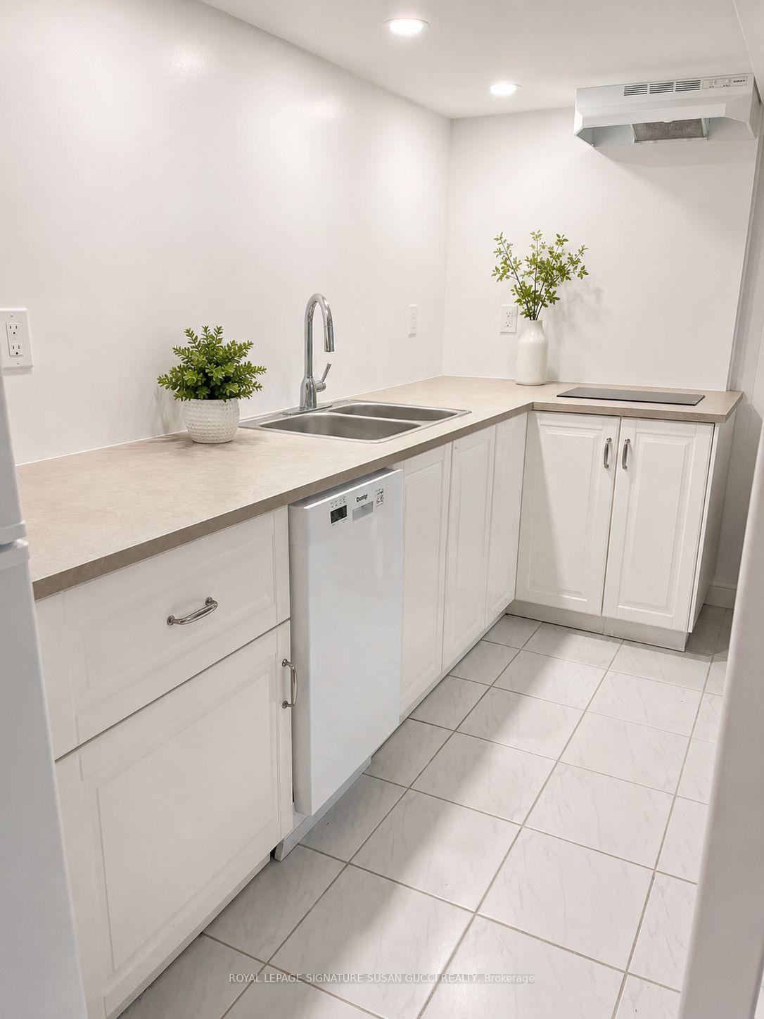 Photo 3 of Unit Lower, 31 Lesmount Avenue, Toronto, Danforth Village-East York — HOMEH