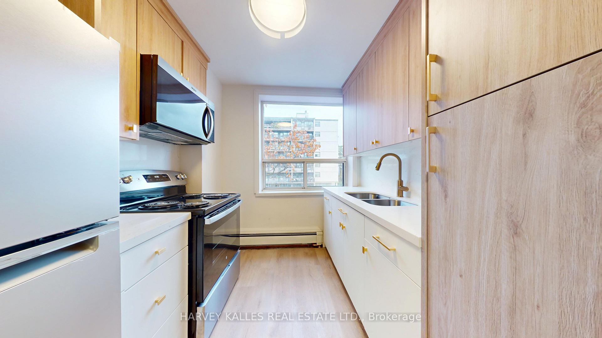 Photo 6 of Unit 14, 1 Marquette Avenue, Toronto, Englemount-Lawrence — HOMEH