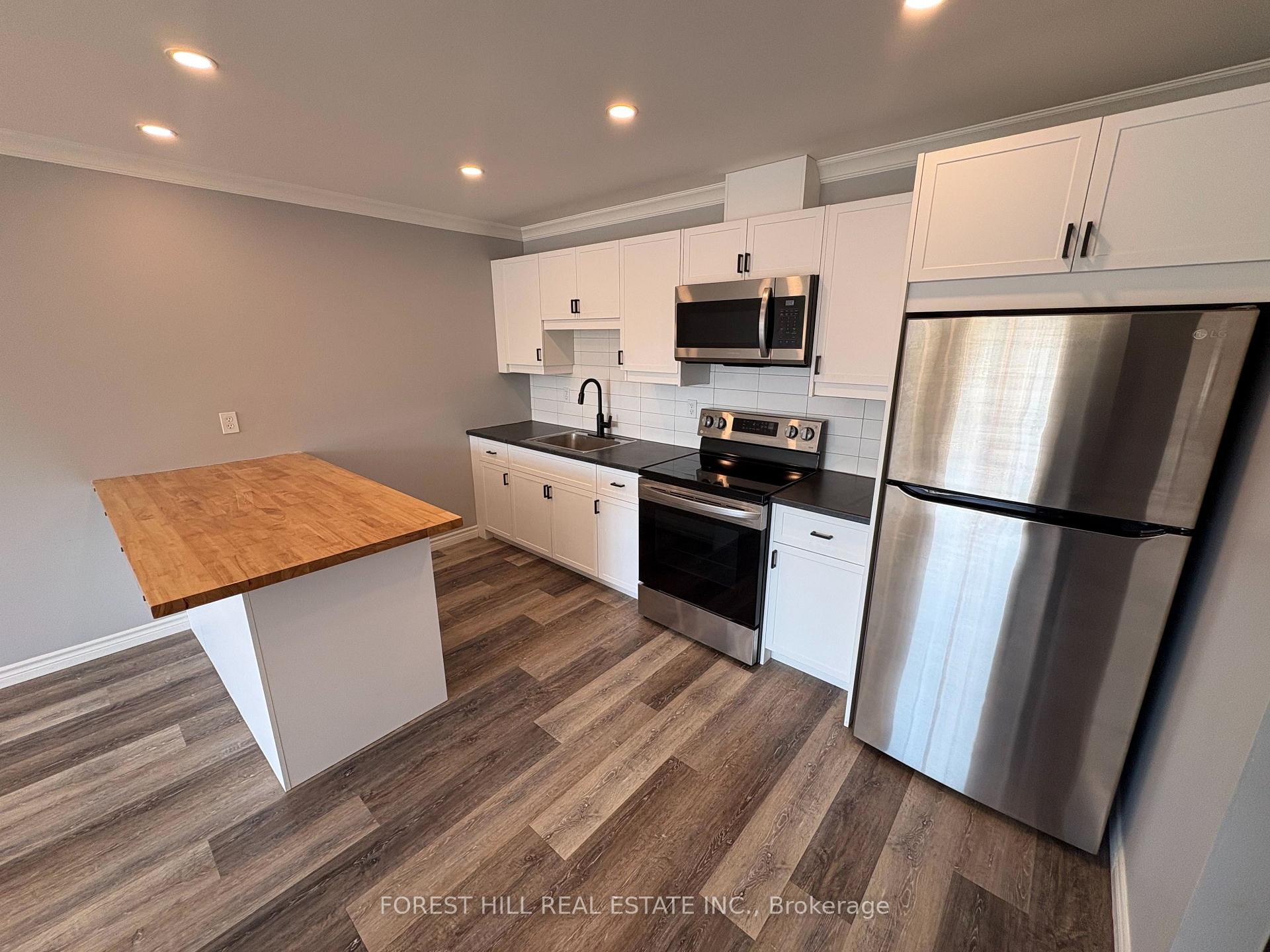 Photo 1 of Unit 5, 130 King Street E, Clarington, Bowmanville — HOMEH