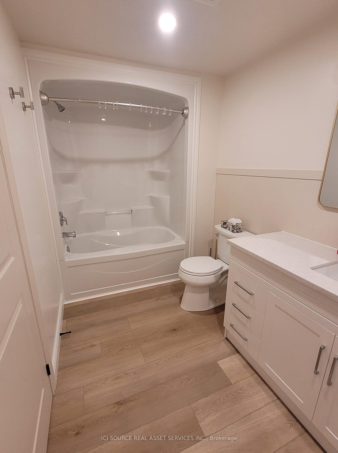 Photo 21 of Unit Lower, 66 White Sands Way, Wasaga Beach — HOMEH