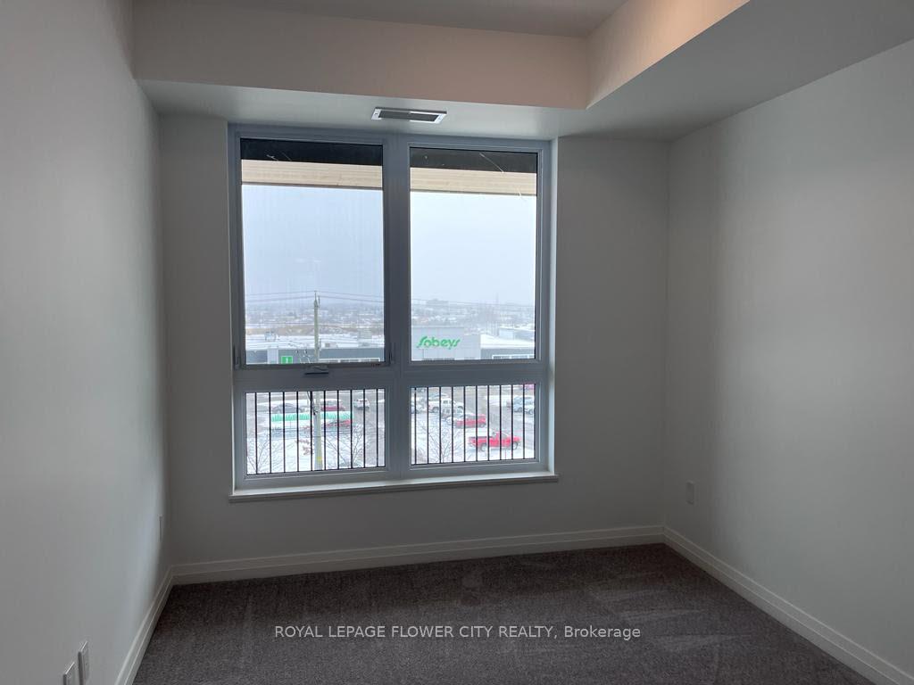 Photo 5 of Unit 409, 101 Golden Eagle Road N, Waterloo, North Lakeshore — HOMEH