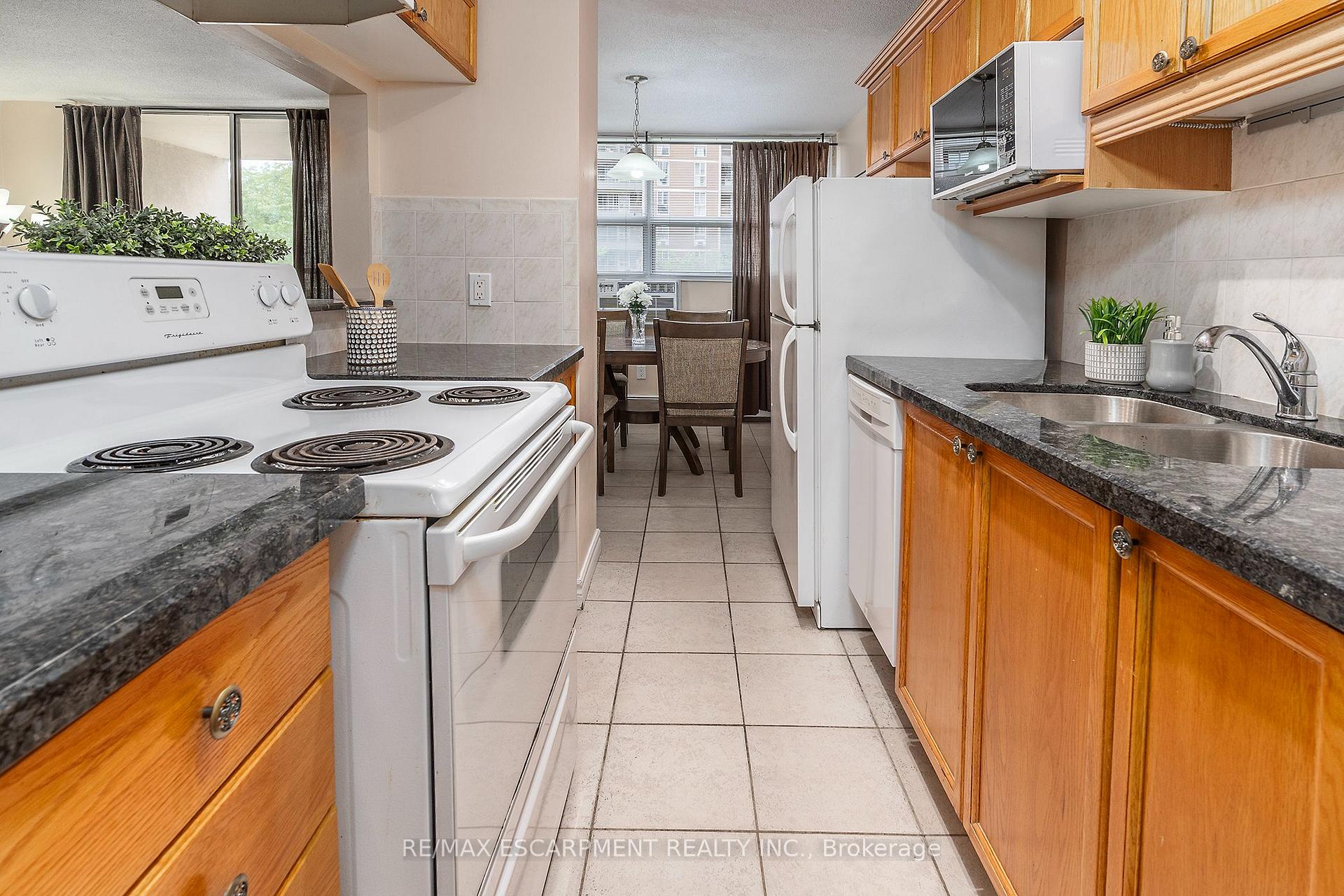 Photo 5 of Unit 307, 1950 Main Street W, Hamilton, Ainslie Wood — HOMEH