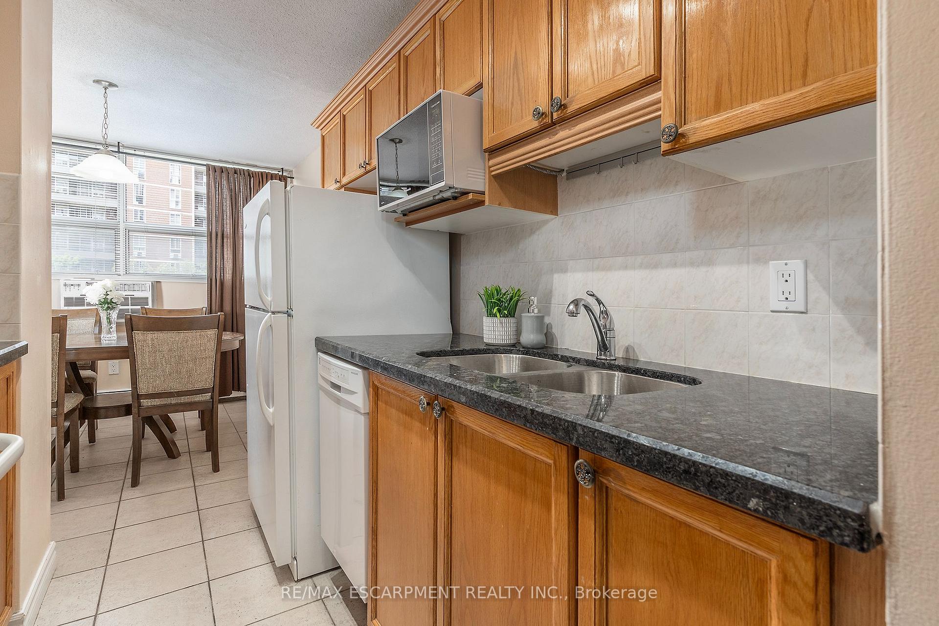 Photo 6 of Unit 307, 1950 Main Street W, Hamilton, Ainslie Wood — HOMEH