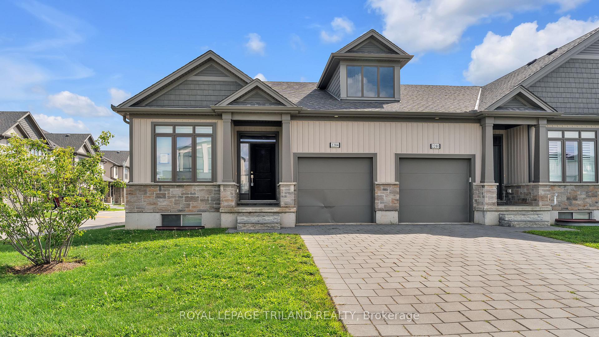Photo 2 of 2284 Evans Boulevard, London, South U — HOMEH