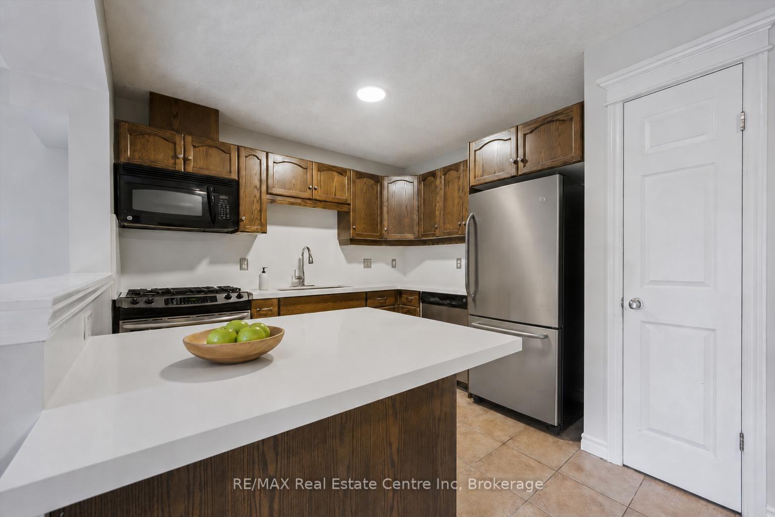 Photo 4 of 53 Washburn Drive, Guelph, Grange Road — HOMEH