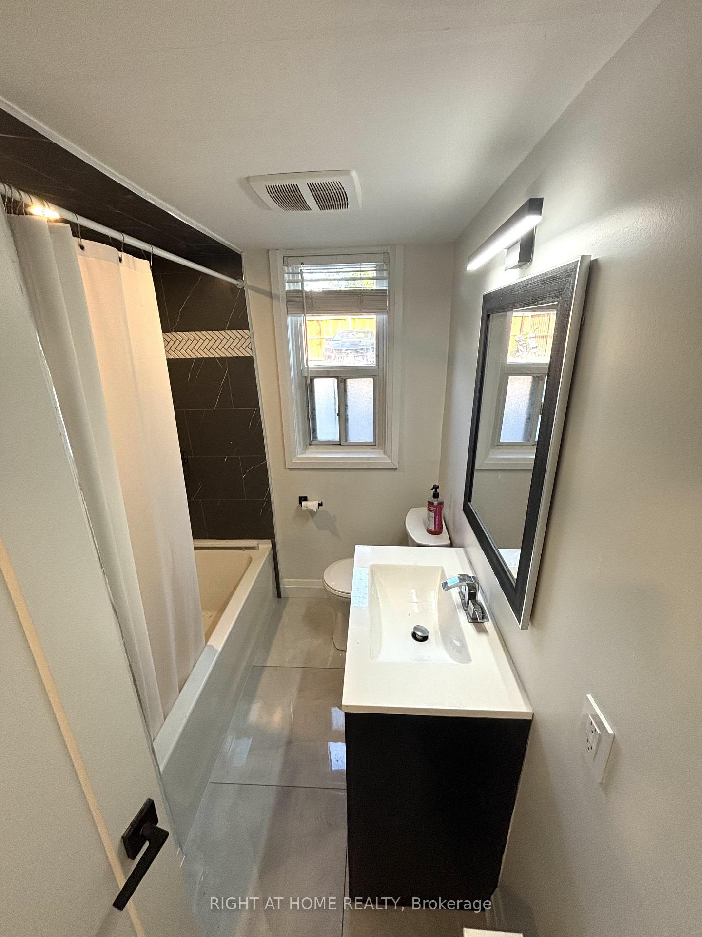 Photo 6 of Unit 1, 31 Wesley Street, Etobicoke, Mimico — HOMEH