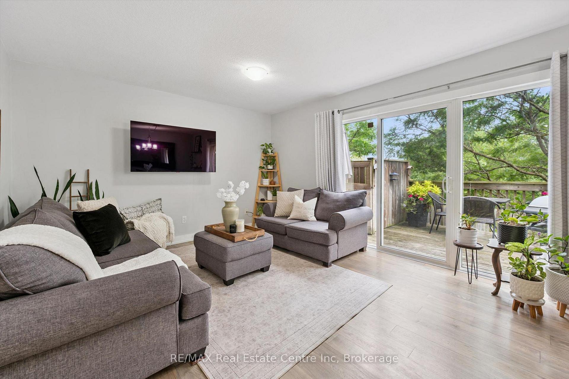 Photo 3 of Unit 21, 31 Schroder Crescent, Guelph, Grange Road — HOMEH