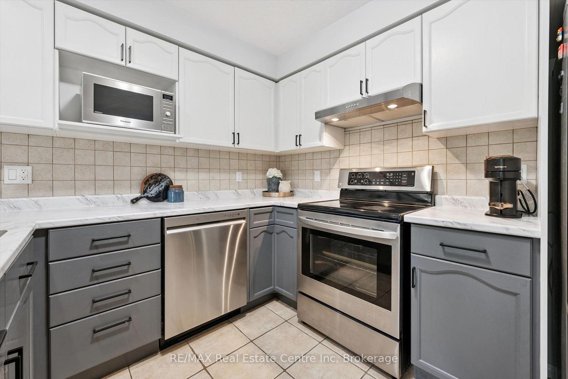 Photo 7 of Unit 21, 31 Schroder Crescent, Guelph, Grange Road — HOMEH
