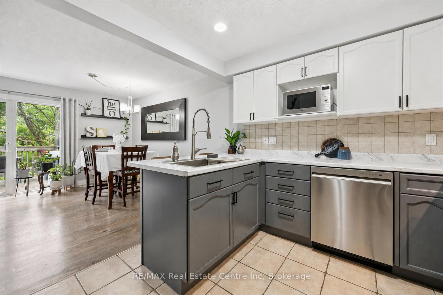 Photo 8 of Unit 21, 31 Schroder Crescent, Guelph, Grange Road — HOMEH